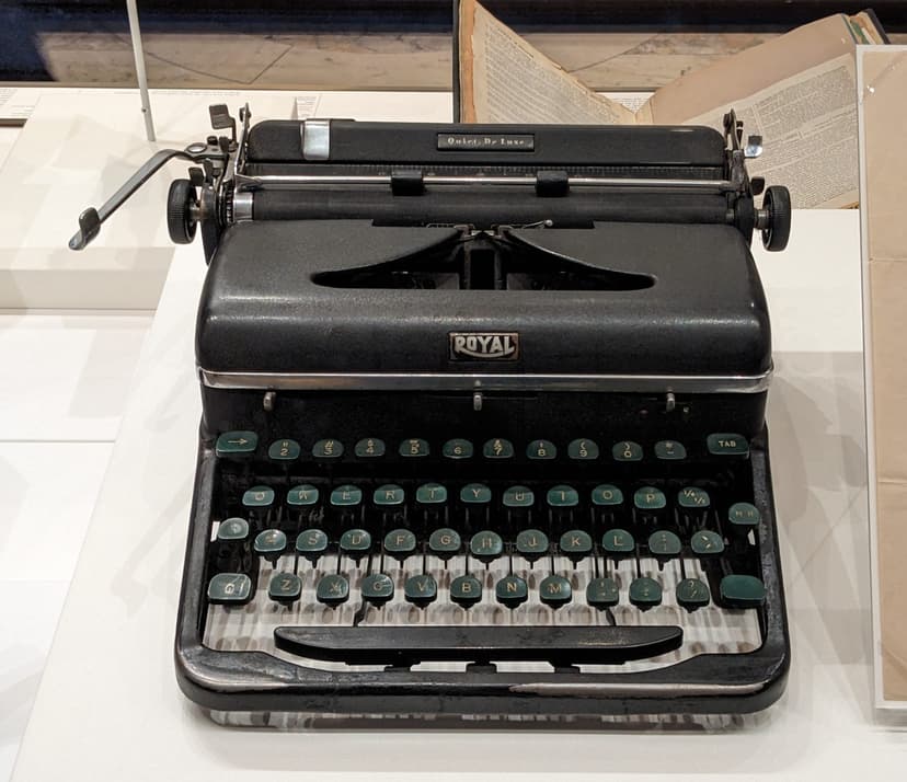 A vintage manual typewriter on a desk
