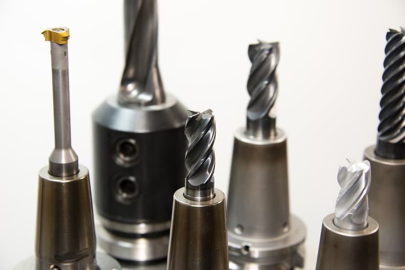 A row of cutting tools standing upright in their holders