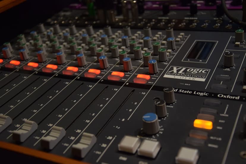 The faders and knobs of a professional audio mixing console