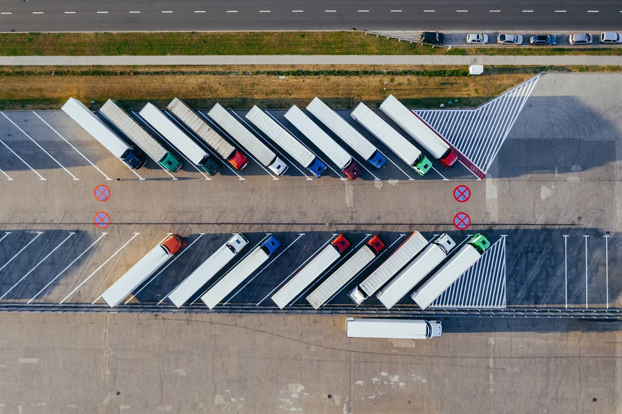 Trucks parked at a logistics yard