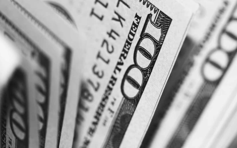 A close-up of United States hundred dollar bills