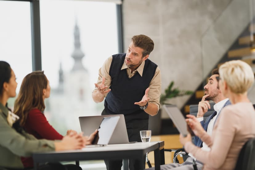 A business leadership meeting in an office