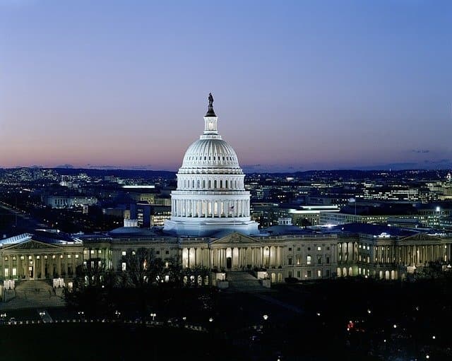 The United States Capitol lit up at dusk